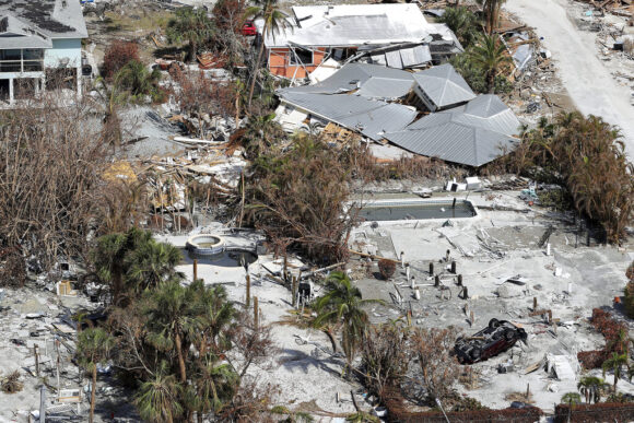 By William Rabb | October 13, 2022 Email This Subscribe to Newsletter Email to a friend Facebook Tweet LinkedIn Print Article Article 2 Comments The parent company of Universal Property & Casualty Co., the second-largest property insurer in Florida, projects its total losses from Hurricane Ian to be about $1 billion, well below its $3 billion reinsurance coverage. The statement came a week after Citizens Property Insurance Corp., the largest in the state, revised its projected losses downward to no more than $2.6 billion. The relatively mild numbers have made some wonder if Ian could turn out to be less costly to the industry than initially feared. Some recent estimates of total industry-wide losses from Ian have been as high as $47 billion in Florida. Fort Lauderdale-based Universal said Tuesday that its expected losses are not huge because it holds a relatively small market share in the hardest-hit areas of southwest Florida. While the carrier commands 7.9% of the entire Florida market based on total insured value – down from about 10% late last year thanks to an effort to shed policies – it has just 3.8% in Charlotte, Desoto, Lee and Sarasota counties, which saw the worst of the winds in Ian. Universal does not write flood insurance policies. And many of its wind policies in those four counties are for condominiums and renters, which would not cover roofs and external structures damaged in the storm. Through early this week, Universal had received about 18,000 claims, half the number of claims received by that point after Hurricane Irma hit in 2017, the company said in a news release. The company said it had claims professionals in the Fort Myers area immediately after the storm, and has been able to handle most Ian claims in-house. “Our thoughts are with all impacted Florida residents,” CEO Stephen Donaghy said in a statement. “We’re focused on helping our policyholders rebuild and return to normalcy. Our claims, catastrophe response and customer service teams are on the ground and on the phone, helping our policyholders in their time of need.” Some Florida insurance executives have speculated that total loss projections made by a number of national analysis firms, some of which initially underestimated losses from Hurricane Irma in 2017, may have overcompensated this time. One recent estimate, by RMS, a Moody’s Analytics firm, pegged total losses from Ian at as high as $74 billion for the five states where it touched. The estimate does not include flood losses, but does factor in potential litigation costs. But that model may not be considering the fact that the Florida Legislature in the last three years has approved several measures designed to reduce claims litigation and attorney fees, some Floridians have said. Other companies with significant exposure in the southwest Florida counties have not released their estimated loss numbers. Olympus Insurance, which earlier this year held about 13,800 policies and $11 billion in exposure in the counties with the most damage, could not be reached for comment Wednesday. HCI Group, which includes Homeowners Choice P&C Insurance and TypTap Insurance, had about 19,000 policies in force in the four counties, according to the Florida Office of Insurance Regulation’s quarterly reports. So far, HCI has seen about 10,000 Ian claims and expects another 2,000 over the next month. The Tampa-based company said that the losses from Hurricane Ian would result in a $78 million net loss for the third quarter of this year. Total estimated losses from the storm have not been released, a spokesman said. But HCI’s update to shareholders this week provided some data that suggests that Ian may not have the impact that Irma had, and that industry-wide projections for Ian’s impact could be a little high. An estimated 560,000 homes in Ian, for example, were exposed to hurricane-strength winds above 74 mph. That’s less than a third of the number of homes in that category during Irma five years ago, HCI noted. The HCI companies’ policies exposed to those severe winds so far are projected to be about 21,000, less than half of the number in Irma. Whatever the final number on HCI’s losses, the company said it has ample resources and “significant reinsurance protection” for the remainder of the contract year. Part of that reinsurance picture for HCI and others is Florida’s Hurricane Catastrophe Fund, which was recently questioned by some in the industry after Ian made landfall. “FHCF is more solvent than speculated,” the presentation noted. “For Ian, some carriers might use little to no reinsurance limit provided by the FHCF. Others might fully exhaust their entire FHCF coverage. Any limit not utilized by an individual carrier will be available in the future.” United Property & Casualty Insurance Co. on Wednesday also said it has received about 19,000 Ian claims. It expects to see as much as 30,000 total, with at gross estimated loss of $1 billion, the company said in a statement. As of Wednesday, Oct. 12, the OIR reported that 495,667 claims have been filed due to Ian. Total estimated insured losses have reached almost $5 billion. Photo: Part of Fort Myers Beach, Florida, after Ian. (AP Photo/Alex Menendez)