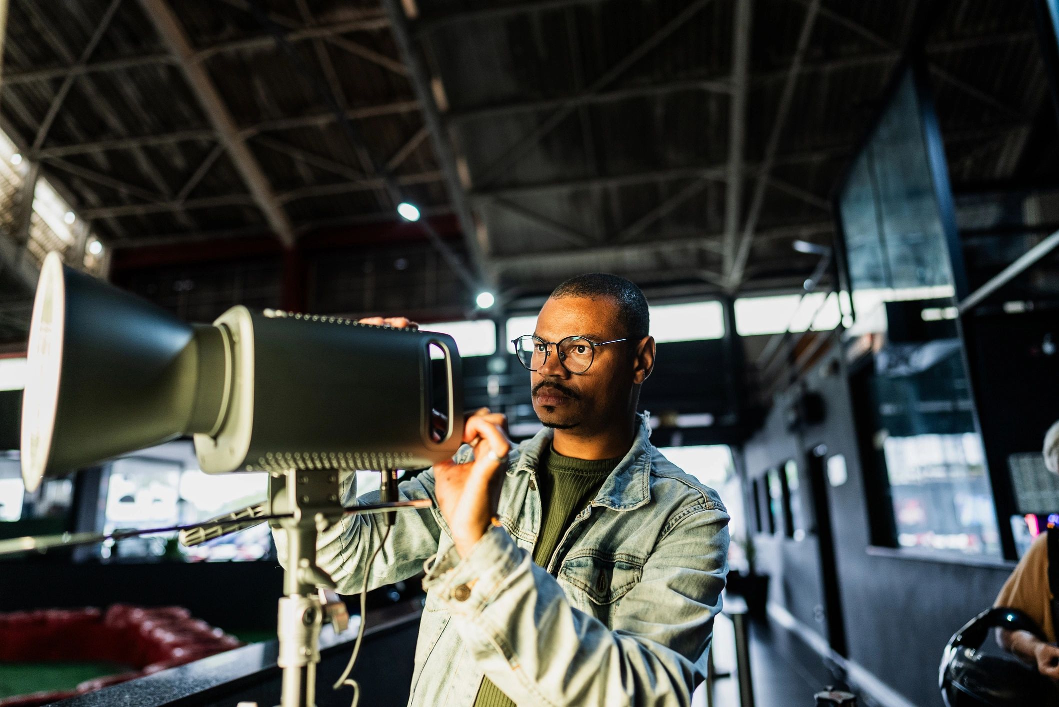 Technician performing moisture inspection with a meter during water damage assessment